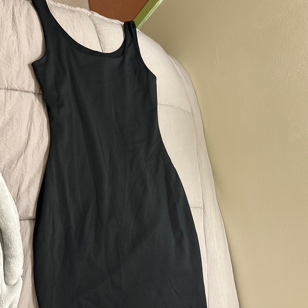 Tank top cut dress, mini, spandex material.